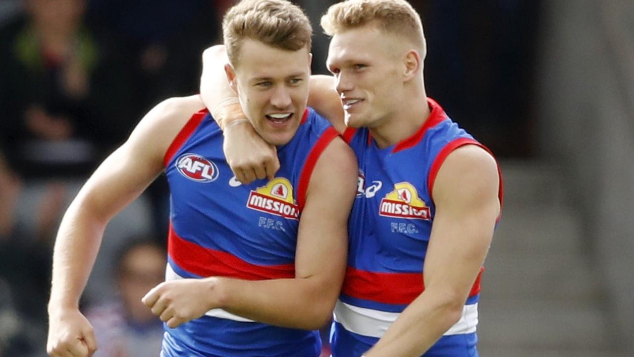 Jack Macrae and Adam Treloar both had monster games in the Dogs’ win. Picture: AFL Photos/Getty Images