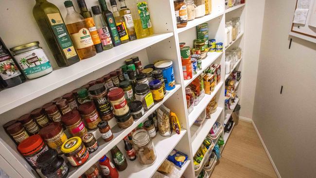 Corey Parker likes his kitchen pantry to be organised. Picture: Nigel Hallett.