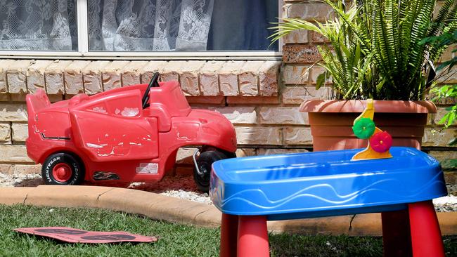 Toys out the front of the family home. Picture: AAP/ John Gass