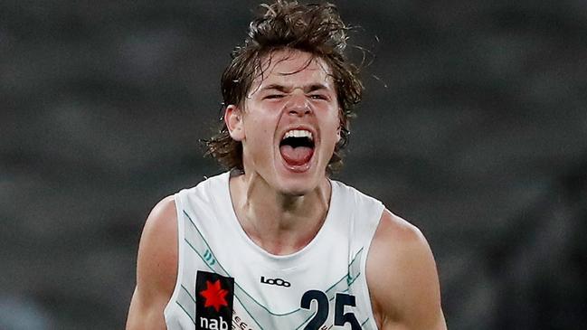 Aaron Cadman celebrates after putting Vic Country in front late in the last quarter. Picture: Dylan Burns/AFL Photos via Getty Images