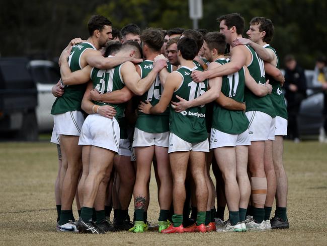 NFNL: Northern Football Netball League Division 1, Melbourne Greyhounds Seniors, Round 15. Heidelberg v Greensborough at Warringal Park, Heidelberg, Victoria, Saturday, 3rd August 2024. Greensborough in the huddle. Photo: Andrew Batsch