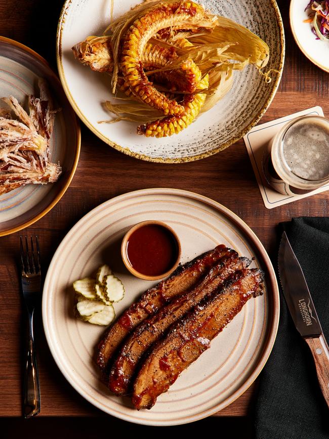 The 16-hour Smoked Cape Grim Brisket, Crackin Corn Ribs and Fried Blooming Shallots. Picture Courtesy of the Longhorn Smokehouse.