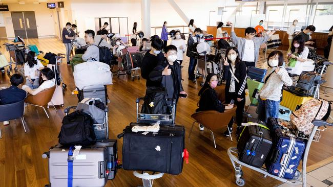 International students at Brisbane Airport. Picture: Richard Walker