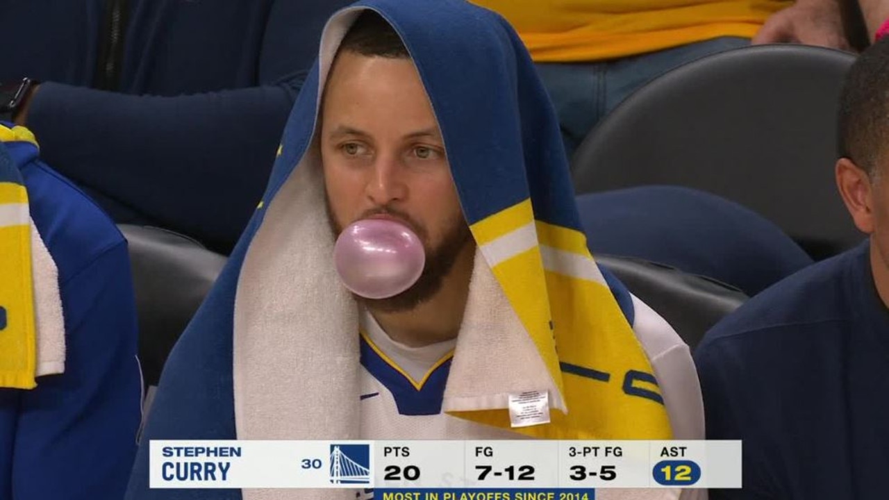 Steph Curry was chilling on the bench.