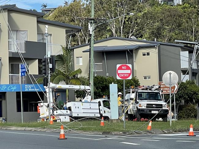 ‘Huge bang’: Sparks fly as powerlines snap over busy intersection