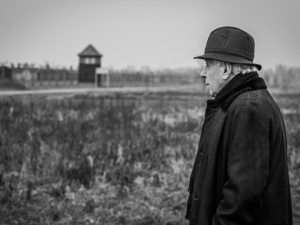 Sir Frank Lowy returned to Auschwitz for the 80th anniversary of the camp’s liberation. Sir Frank’s extraordinary life story is the subject of the 219 Foxtel documentary, What Will Become of Us. Picture: supplied/Foxtel