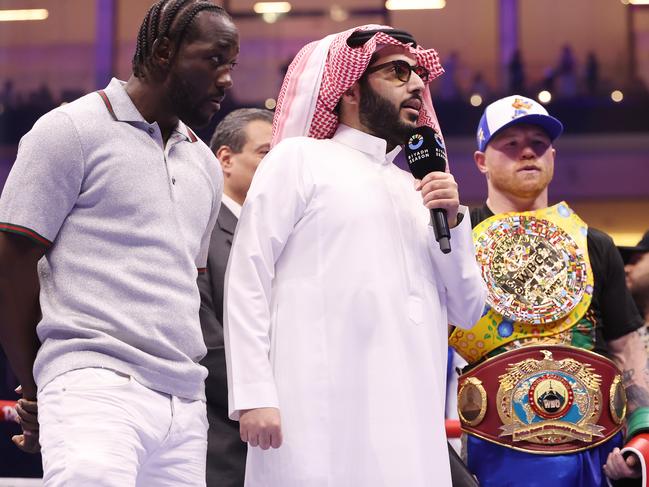 Crawford (L) will fight Canelo (R) in September in the biggest boxing match of 2025. Picture: Richard Pelham/Getty Images