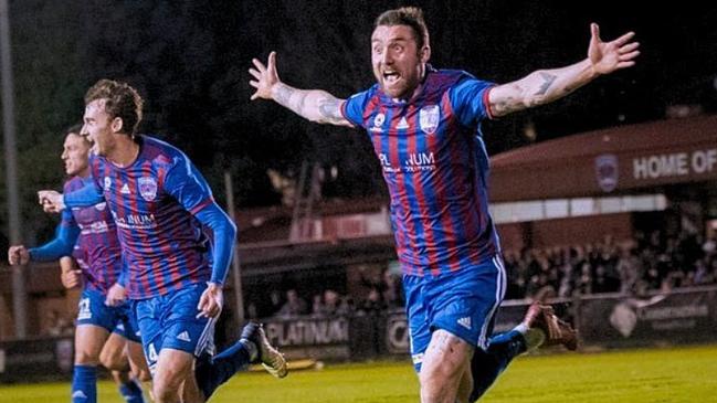 Chris Duggan celebrates a goal for Port Melbourne.