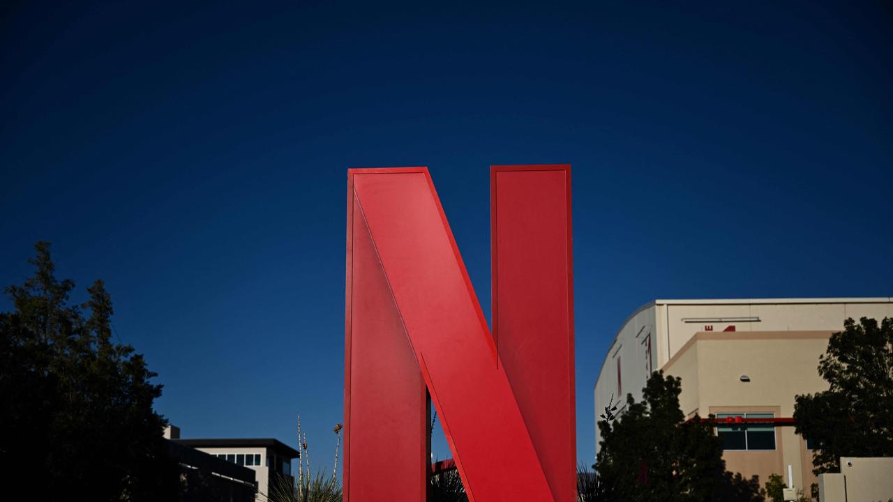 The Netflix logo is displayed at the entrance to Netflix Albuquerque Studios film and television production studio lot in Albuquerque, New Mexico. Photo: Patrick T. Fallon / AFP.