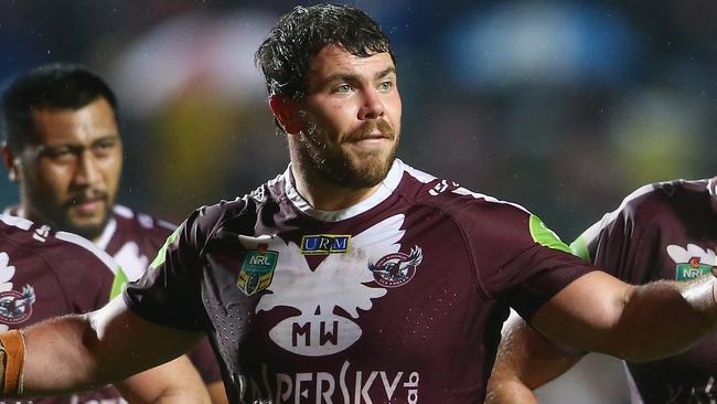 SYDNEY, AUSTRALIA - AUGUST 23: Blake Leary, Josh Starling and Jake Trbojevic of the Eagles look dejected during the round 24 NRL match between the Manly Warringah Sea Eagles and the Parramatta Eels at Brookvale Oval on August 23, 2015 in Sydney, Australia. (Photo by Mark Kolbe/Getty Images)