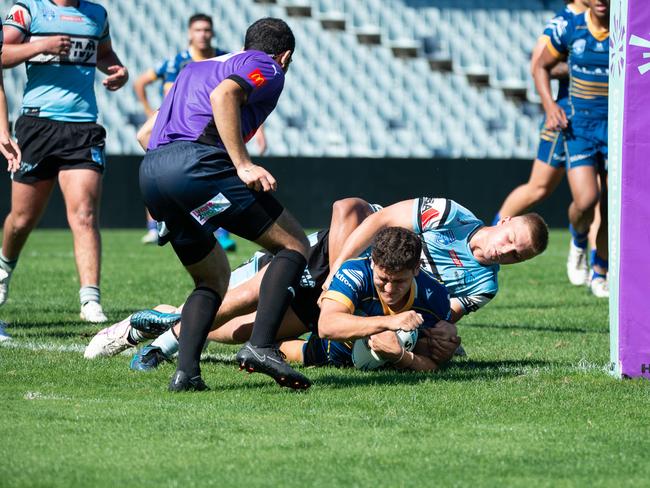 Mikayel Tito scoring a try. Picture: Thomas Lisson