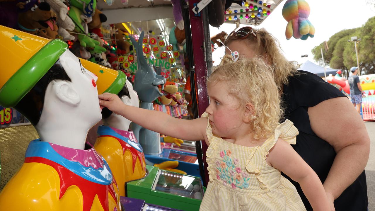 Elka Strom playing the clowns watched on by mum Honor of Waurn Ponds at the Geelong Show. Picture: Alison Wynd