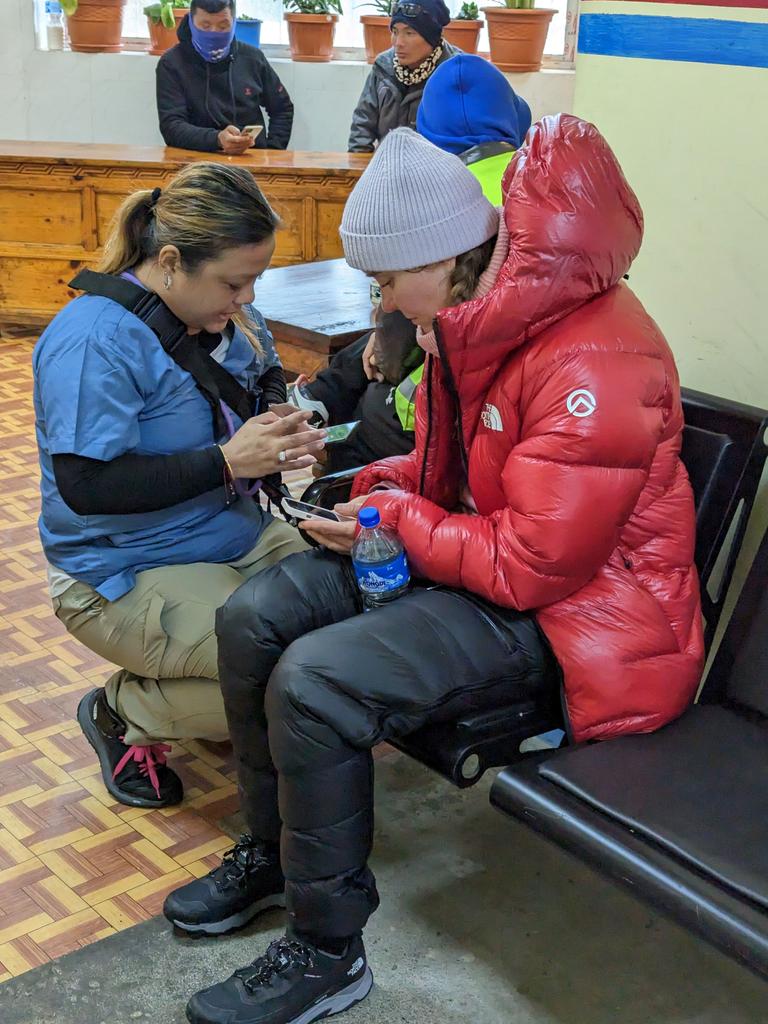 Global Rescue’s Flor DeJasmin Agustin, a medical operations supervisor/nurse, assisting a patient following a rescue.