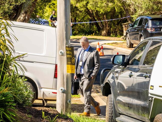 Homicide detectives arrive at the Parson Street home. Picture: Jake Nowakowski