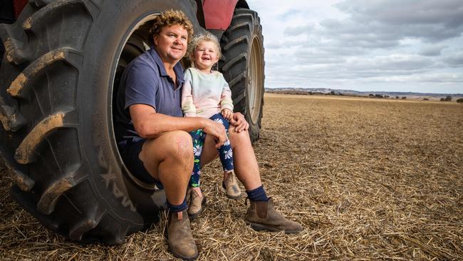 Fourth generation Riverton farmer Sam Przibilla with daughter Aubree, 3, at their Riverton Farm. Picture: Tom Huntley