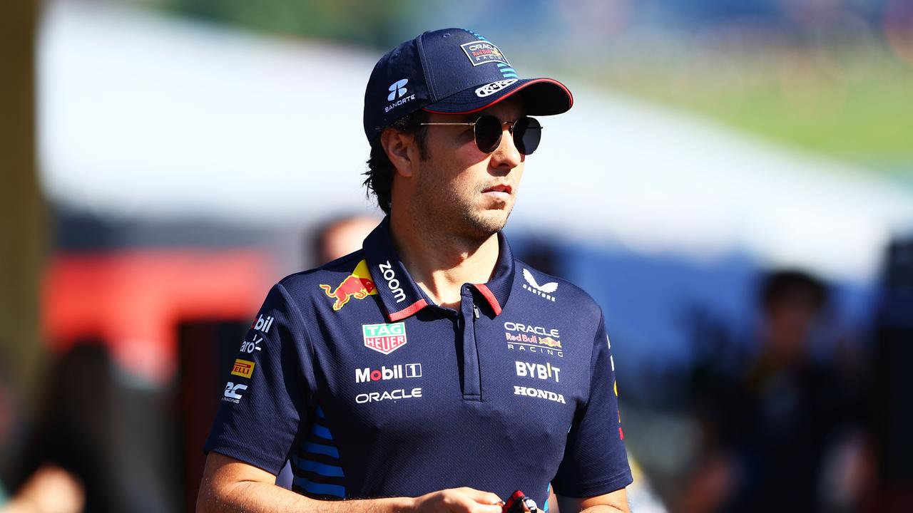 SPIELBERG, AUSTRIA - JUNE 29: Sergio Perez of Mexico and Oracle Red Bull Racing walks in the Paddock prior to the Sprint ahead of the F1 Grand Prix of Austria at Red Bull Ring on June 29, 2024 in Spielberg, Austria. (Photo by Clive Rose/Getty Images)