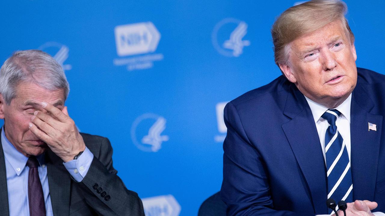 Dr Fauci, seen here with President Donald Trump, is perhaps the most visible medical expert in the US. Picture: Brendan Smialowski / AFP