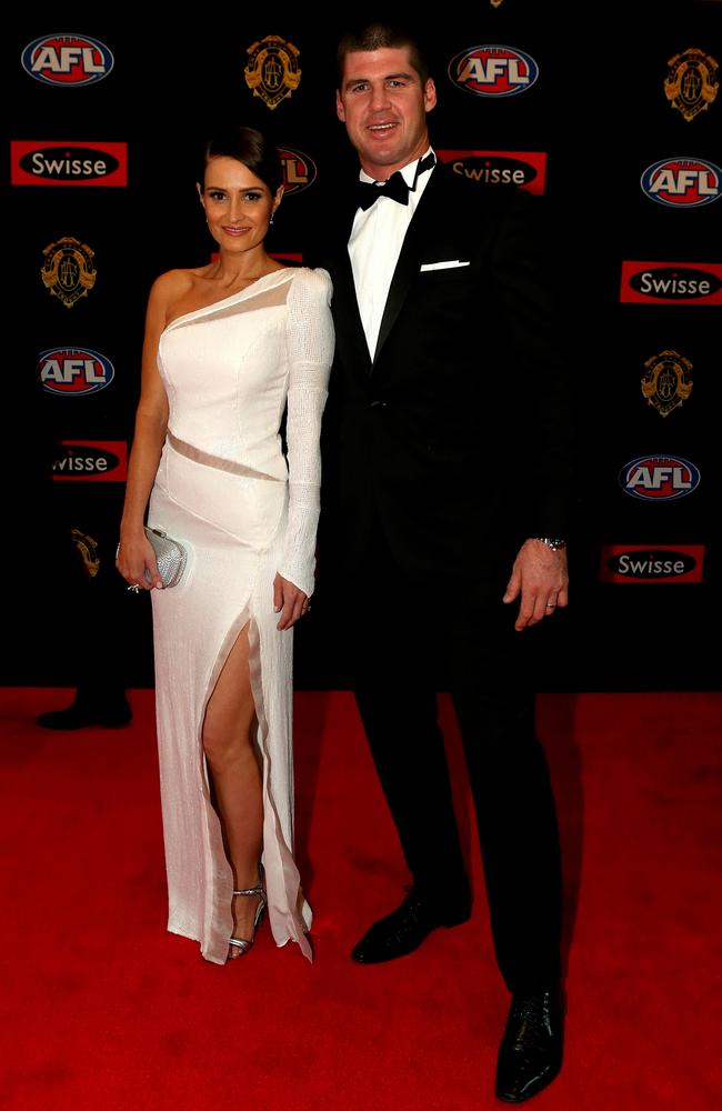 Jonathan and Kylie Brown on the red carpet during the arrivals for the 2014 AFL Brownlow Medal at Crown Casino