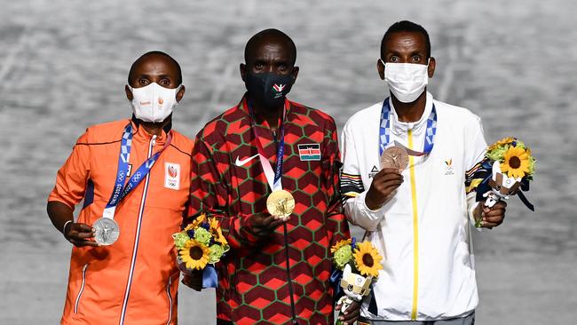 Abdi Nageeye, Eliud Kipchoge and Bashir Abdi. Picture: AFP