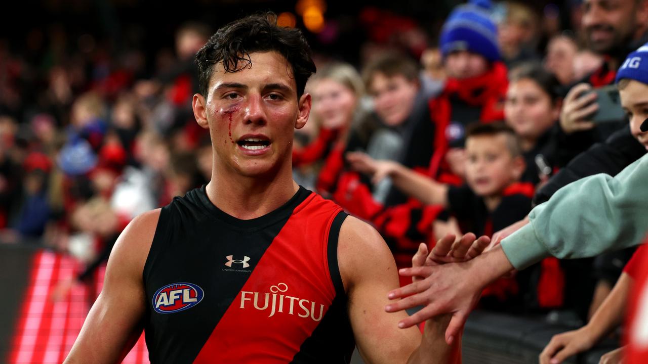 Jye Caldwell celebrates with fans after their win. Picture: Quinn Rooney/Getty Images