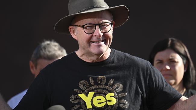 ULURU, AUSTRALIA, NewsWire Photos. OCTOBER 11, 2023: The Australian Prime Minister Anthony Albanese with Pat Farmer as he finishes his run around the country to raise awareness about the Yes campaign in Uluru. Picture: NCA NewsWire / Martin Ollman