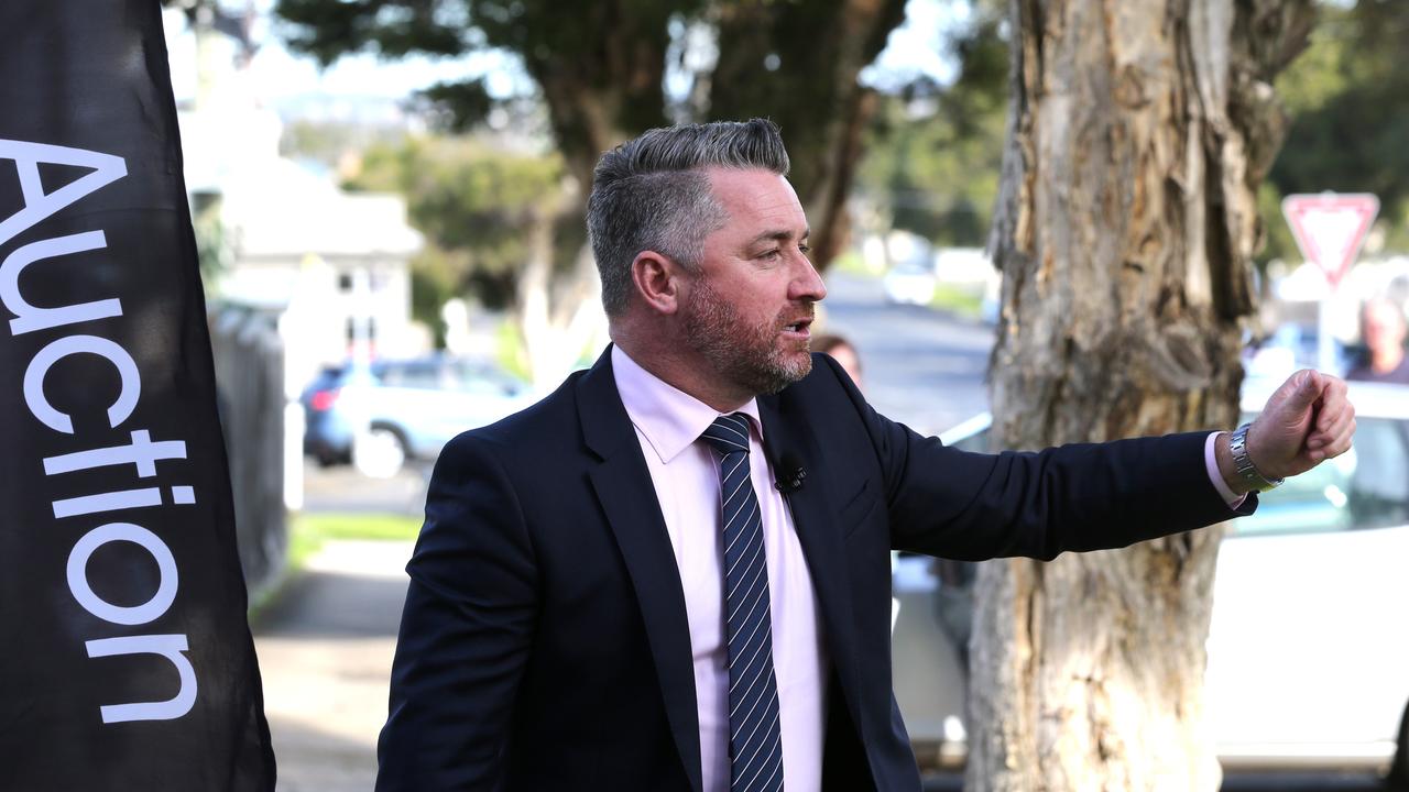 Hodges, Geelong West auctioneer Marcus Falconer calls for bids. Picture: Mike Dugdale