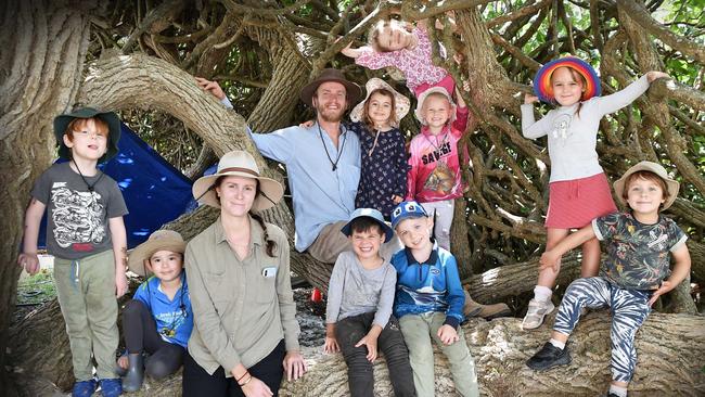 Pelican Waters Golden Beach Kindergarten & Childcare recently received an "excellent" rating on their centre. Pictured in the outdoor camp are educator Alyse Monaghan and nature camp coordinator Tyler Inglis with center children. Picture: Patrick Woods.