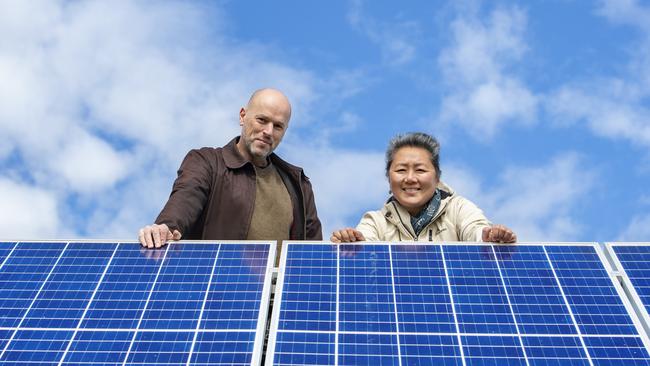 Solar flair: Nick Bray and Cynthia Lim from Blue Tongue Berries near Seymour are self-sufficient for power, food and water.