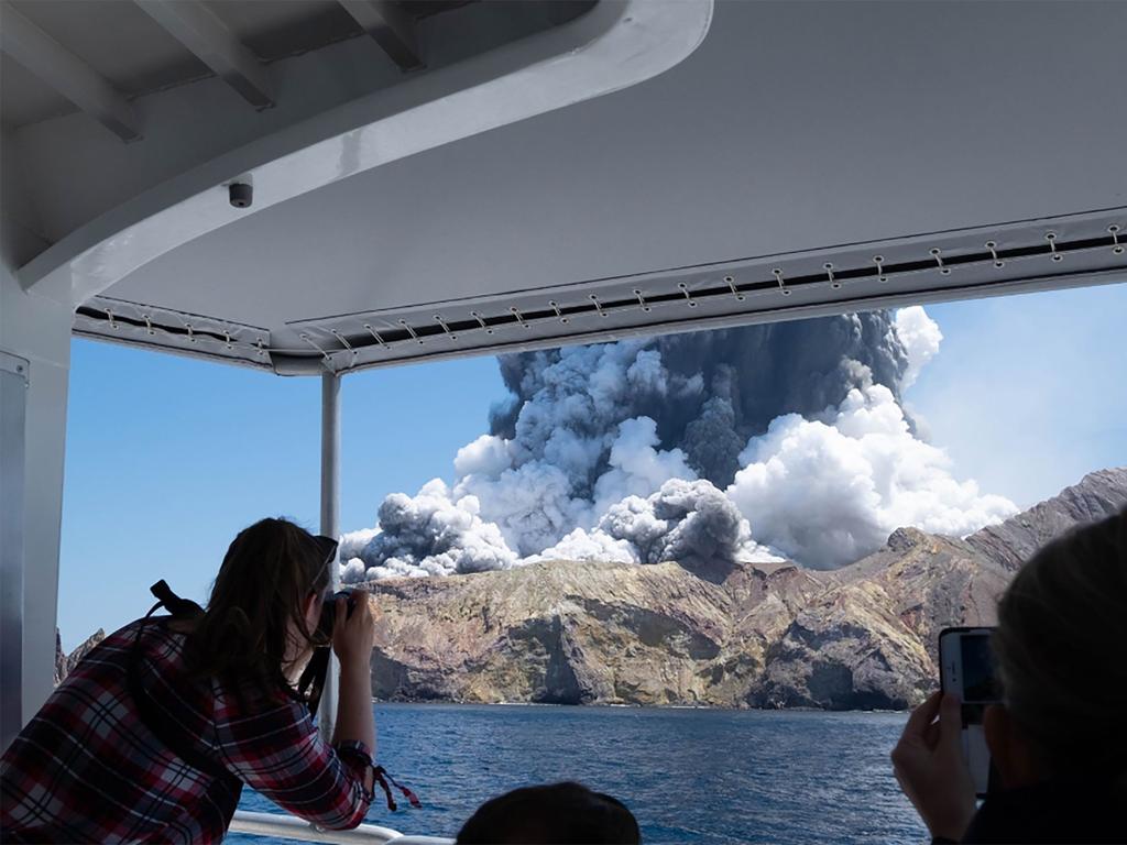 New Zealand's White Island spewing steam and ash moments after it erupted.Picture: Michael Schade / AFP