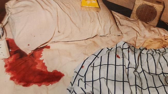 The bloody sheets after Mr Robinson stabbed Mr Whitehead in the neck during the home invasion. Photos: Courts SA