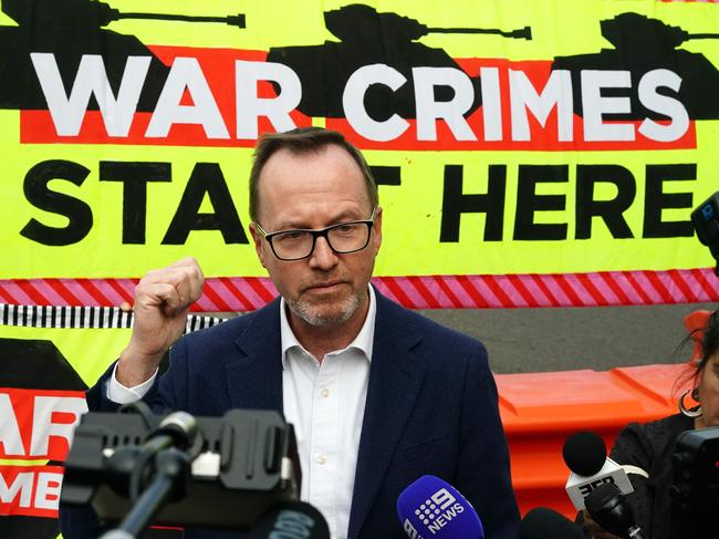 Greens Senator David Shoebridge addresses anti-war protesters outside the Land Forces event in Melbourne. Picture: NewsWire/Luis Enrique Ascui