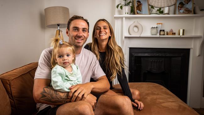 Port Adelaide star Jeremy Finlayson, his wife Kellie and their daughter Sophia. Picture: Tom Huntley