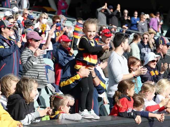 Crows fans cheer after their side’s preliminary final win. There will be a capacity of 40,000 at Saturday’s Grand Final against Brisbane at the Adelaide Oval. Picture: Getty Images