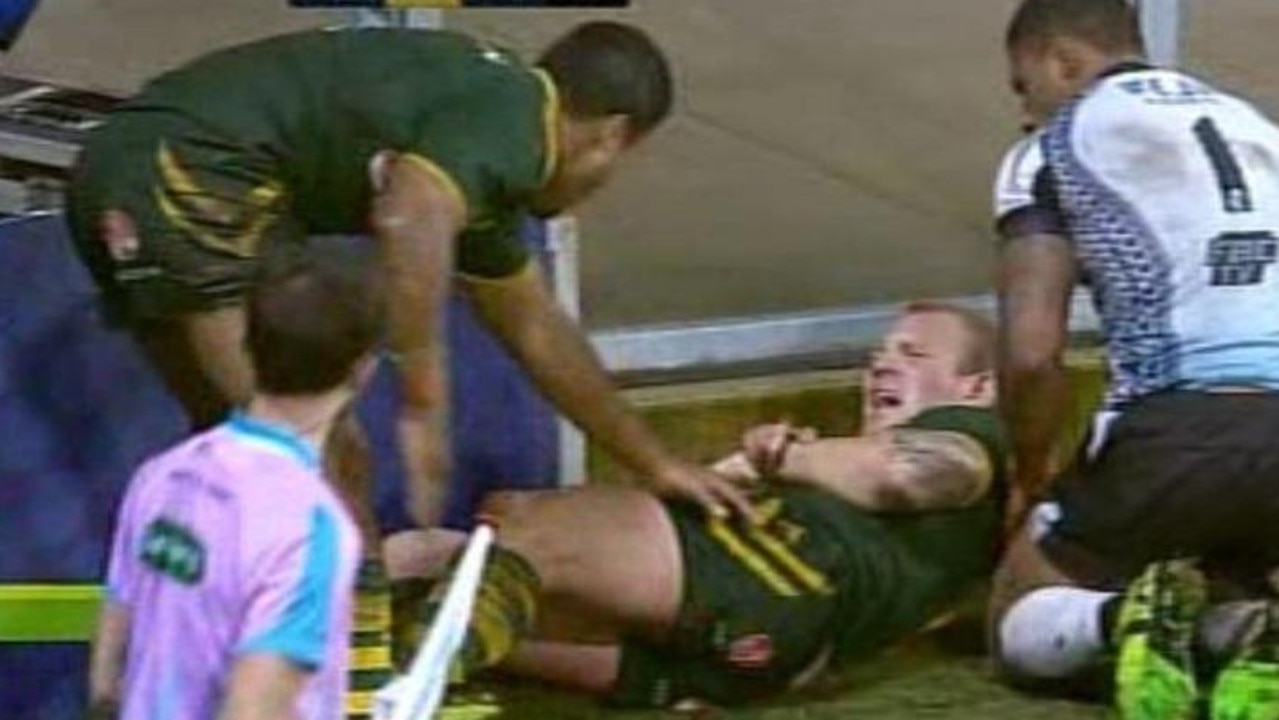 Luke Lewis dislocates his shoulder during the 2013 Rugby League World Cup match against Fiji at Langtree Park, St Helens. Picture: Channel 7