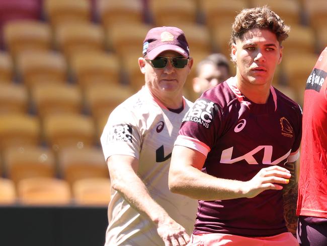 Coach Kevin Walters and Reece Walsh at a the Broncos last training session before departing for Sydney. Picture: Liam Kidston