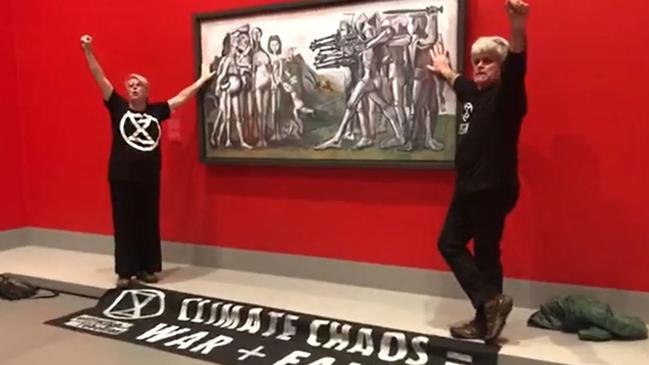 Climate protesters glued themselves to a Picasso painting at the National Gallery of Victoria. Picture: Facebook