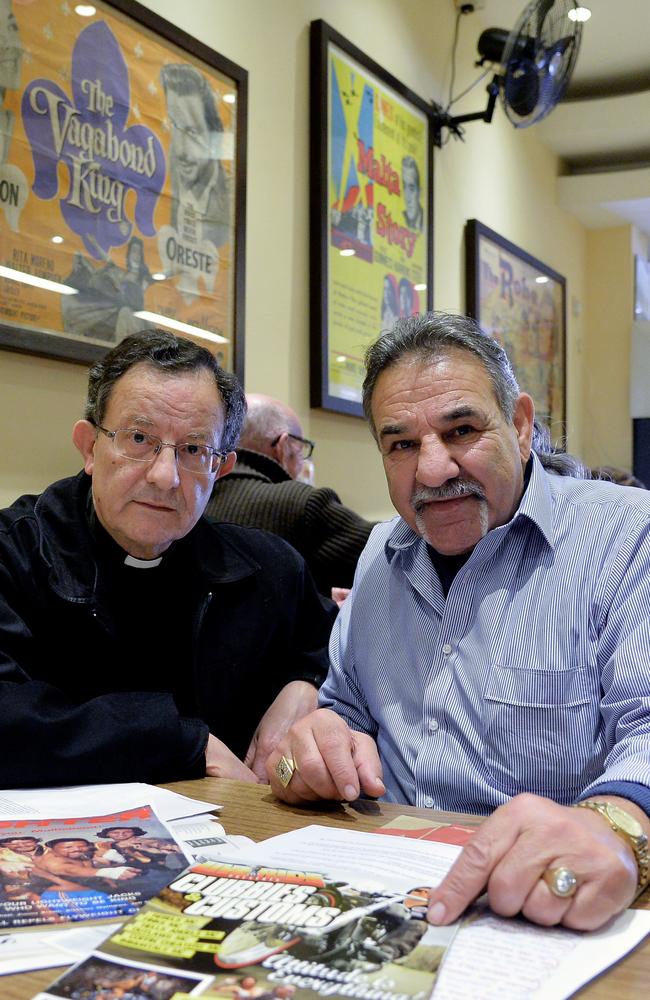 Alex Vella in the Mosta district of Malta with Father Raphael Martino. Picture: David Dyson