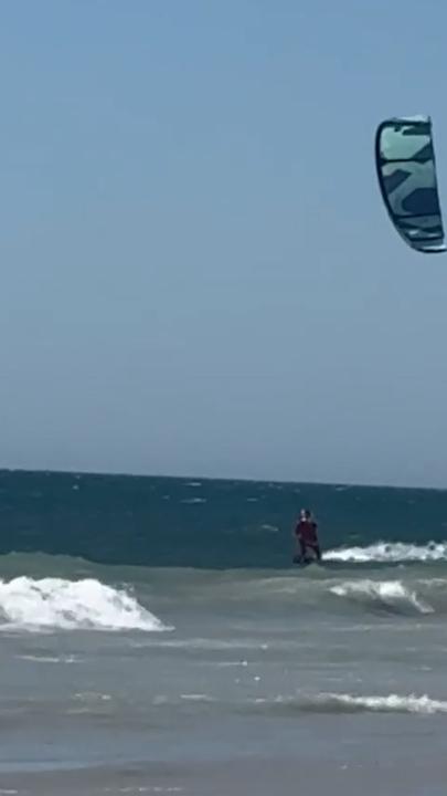 Santa spotted surfing at Western Australia beach