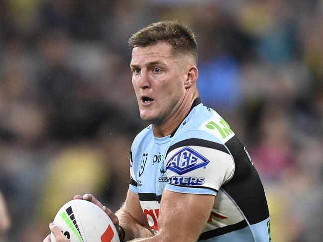 TOWNSVILLE, AUSTRALIA - MARCH 15: Teig Wilton of the Sharks runs the ball during the round two NRL match between North Queensland Cowboys and Cronulla Sharks at Queensland Country Bank Stadium, on March 15, 2025, in Townsville, Australia. (Photo by Ian Hitchcock/Getty Images)