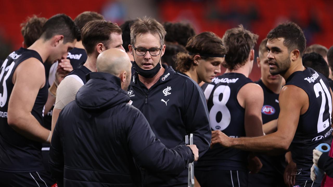 SYDNEY, AUSTRALIA – JUNE 19: Blues head coach David Teague walks away from talking to his players during the round 14 AFL match between the Greater Western Sydney Giants and the Carlton Blues at GIANTS Stadium on June 19, 2021 in Sydney, Australia. (Photo by Mark Kolbe/Getty Images)