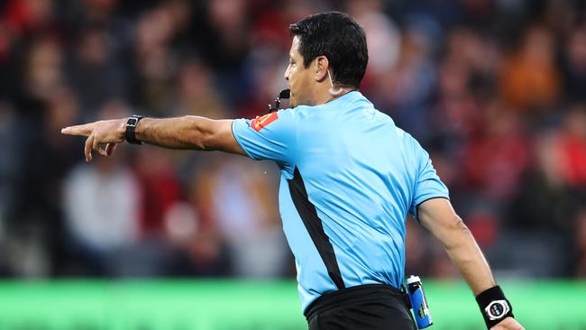 Referee Alireza Faghani points to the penalty spot after reviewing a handball with VAR during the match between Western Sydney and the Central Coast. Picture: Getty Images