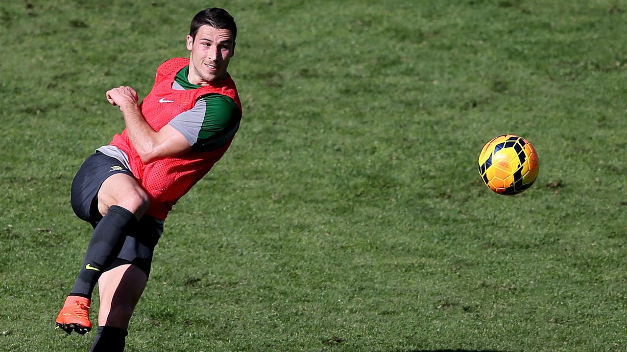 GOSFORD, AUSTRALIA - MAY 21: Matthew Leckie kicks the ball during an Australian Socceroos training session at Central Coast Stadium on May 21, 2014 in Gosford, Australia. (Photo by Ashley Feder/Getty Images)