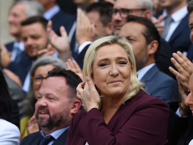 Marine Le Pen poses with members of parliament. Picture: Alain Jocard/AFP