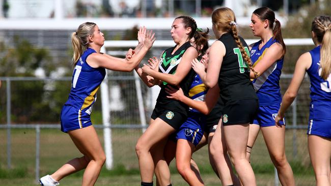 StreetSmart AFLQ Schools Cup Aussie rules - Open Girls Lindisfarne College (Blue yellow white strip) Vs Cavendish Road Picture David Clark