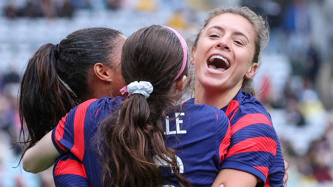 Rose Lavelle of the US celebrates with teammates after scoring a goal.
