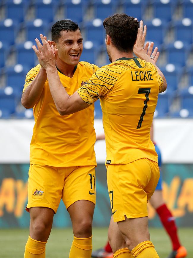 Nabbout and Mathew Leckie celebrate a goal. Picture: Toby Zerna