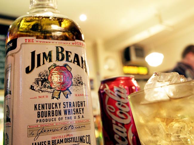 Generic image of bottle of Jim Beam bourbon and a can of Coca-Cola to promote a bourbon and coke ready-to-drink products proposed by both parent companies.