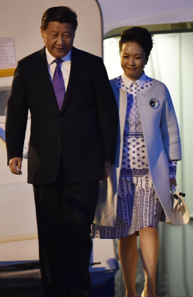 Xi Jinping (L) and Peng Liyuan as they arrive in Sydney on Tuesday, Nov. 18. Picture: AAP Image/Peter Parks