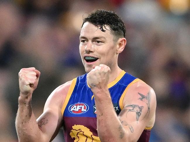 BRISBANE, AUSTRALIA - AUGUST 24: Lachie Neale of the Lions celebrates kicking a goal during the round 24 AFL match between Brisbane Lions and Essendon Bombers at The Gabba, on August 24, 2024, in Brisbane, Australia. (Photo by Matt Roberts/AFL Photos/via Getty Images)