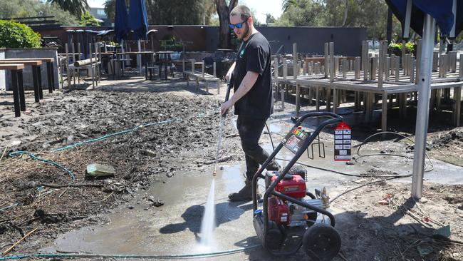 Clean-up in Maribyrnong after last October’s floods. Picture: NCA NewsWire / David Crosling